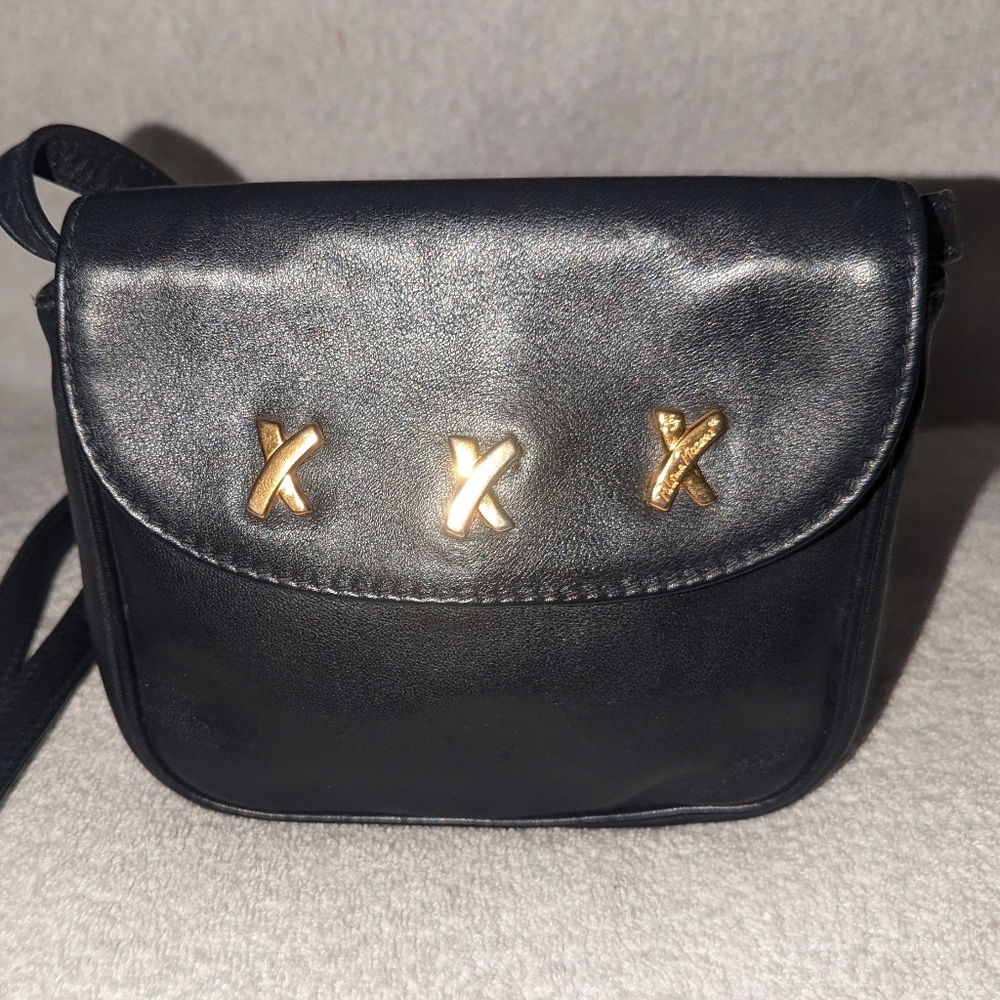 Paloma Picasso black leather shoulder bag.